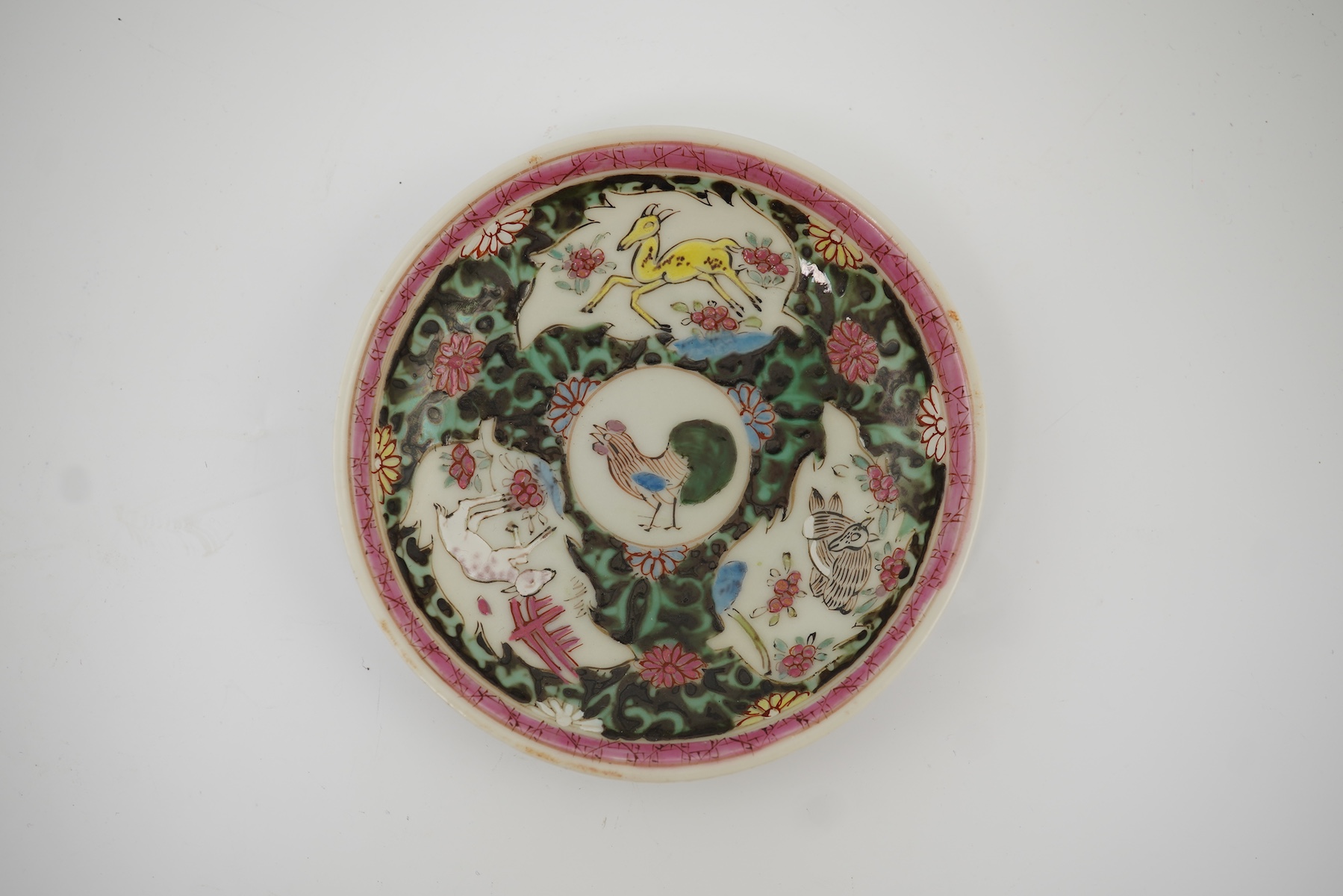 A Chinese semi-eggshell porcelain saucer and a similar tea bowl, Yongzheng period